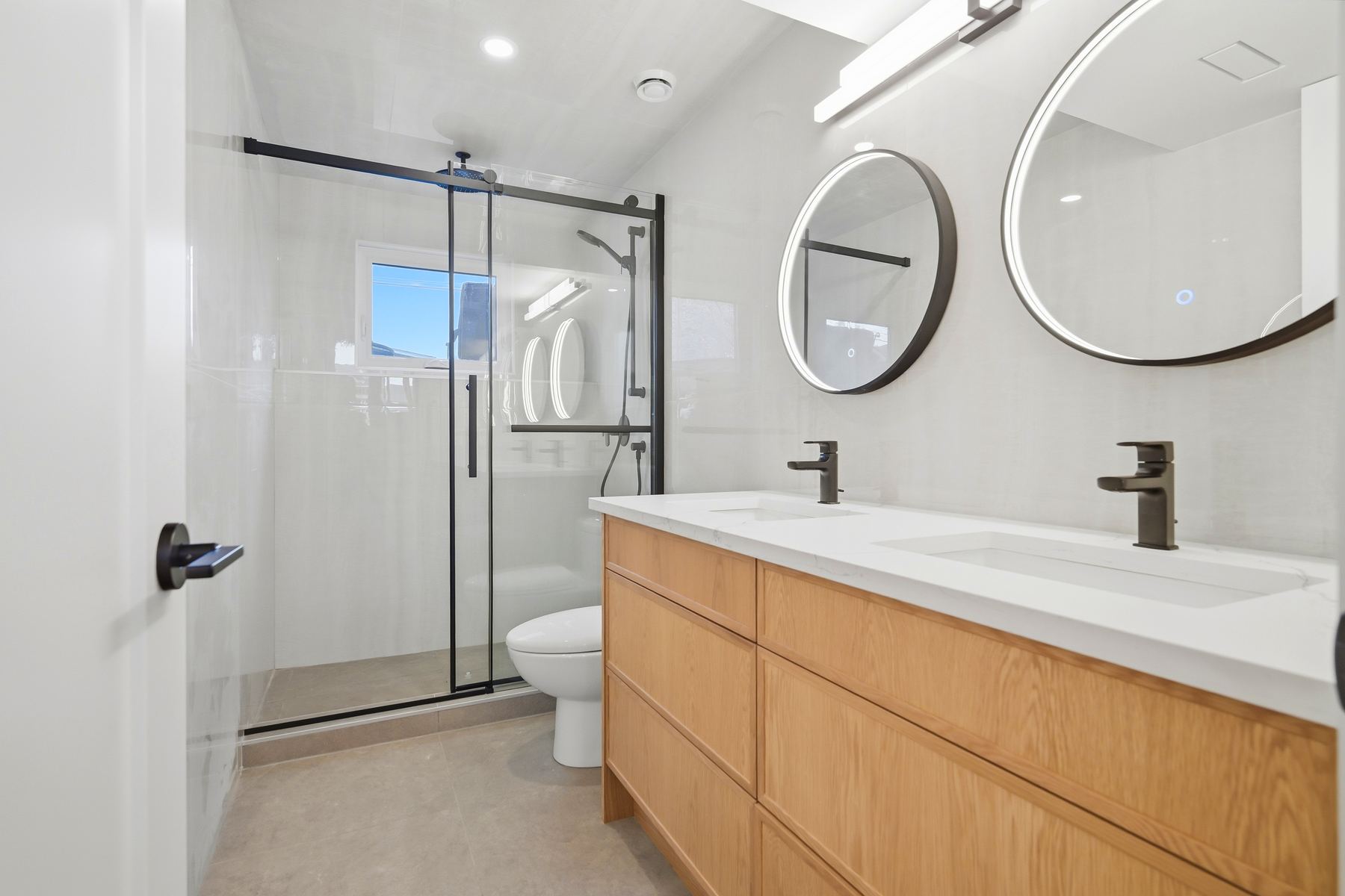 Lower bath with double vanity and walk-in shower