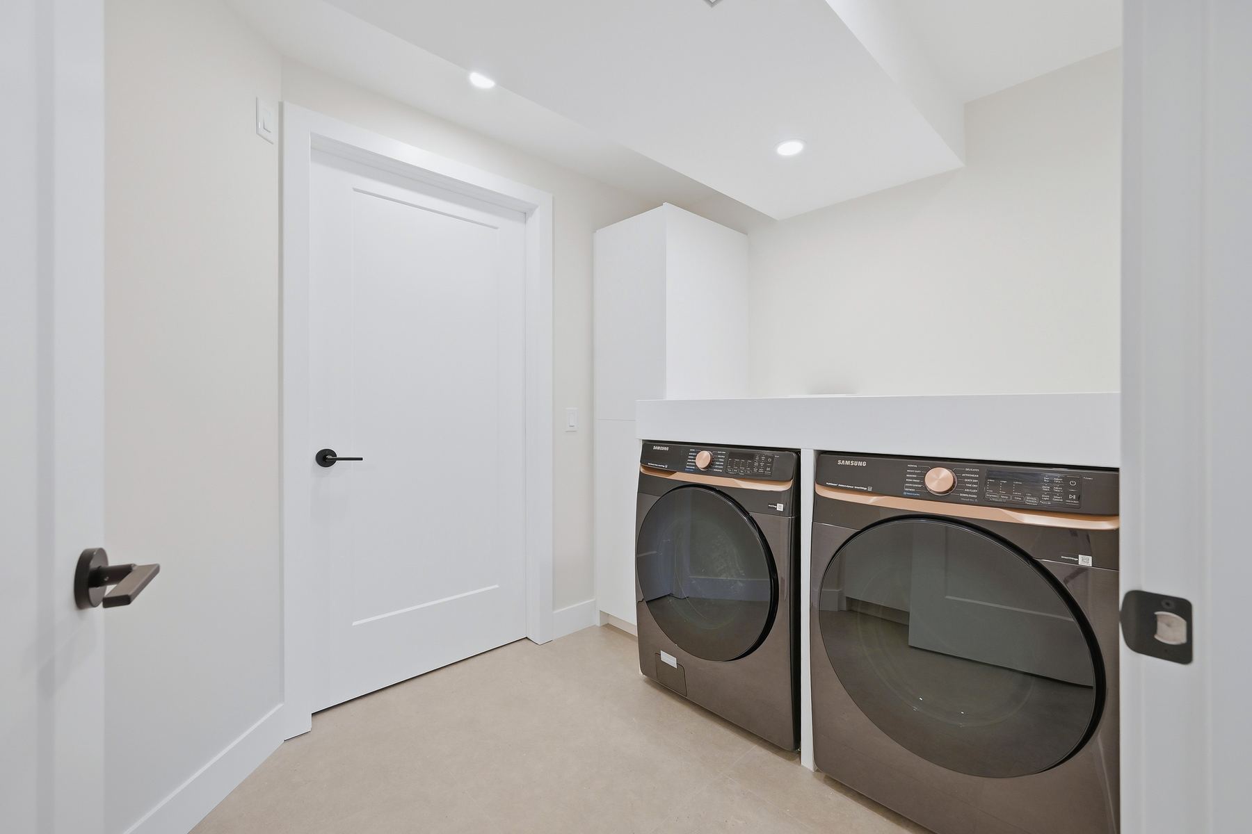Laundry room with washer and dryer